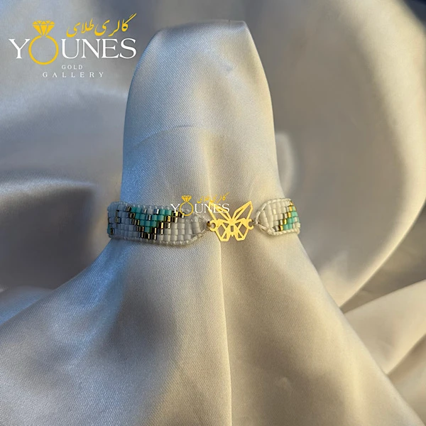 تصویر دوم دستبند میوکی پروانه اوریگامی طلا